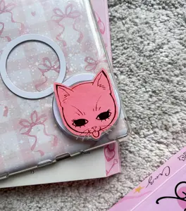 Mean Girl Pink Cat Phone Grip, Aesthetic Bad Kitty Phone Stand, Kawaii Hand-Drawn Character Accessory, Unique Y2K Style Phone Holder, Pastel Pink Ribbon Decor, Artistic Indie Phone Grip