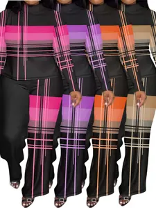 Plus-size women’s two-piece casual striped print set featuring a long-sleeve high-neck top with a slit and loose wide-leg pants. Made from fabric, standard fit, no belt required, suitable for spring and autumn.