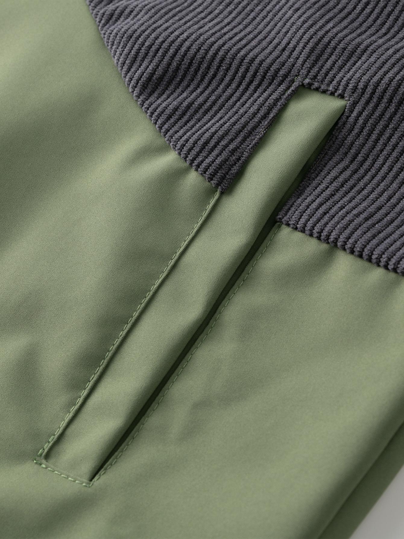 A collared jacket with a patchwork style, visually layered and designed to flatter necklines. The buttoned closure makes it easy to put on and take off. There is one pocket on the left side which is both practical and decorative