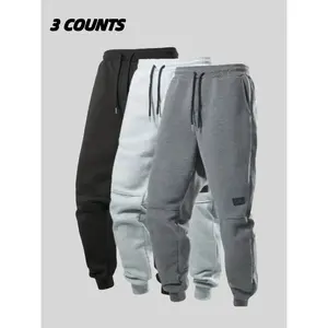 1 piece of men's solid color casual sports pants, comfortable loose pants for autumn and winter, street style drawstring jogging pants, sports underwear
