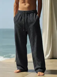 Men’s jacquard loose casual sports pants, suitable for the beach and back-to-school season, ideal for spring/summer wear Plain