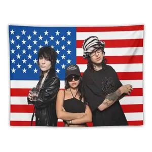 The pink flag-pattern tapestry by Jack and Johnny is an excellent choice for decorating bedrooms and living rooms.