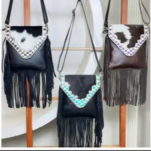 Leather purse featuring real hair on hide and checkered border design