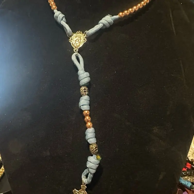 Handmade paracord 5 decade rosary blessed “The Rochelle” Baby blue, with copper and silver beads