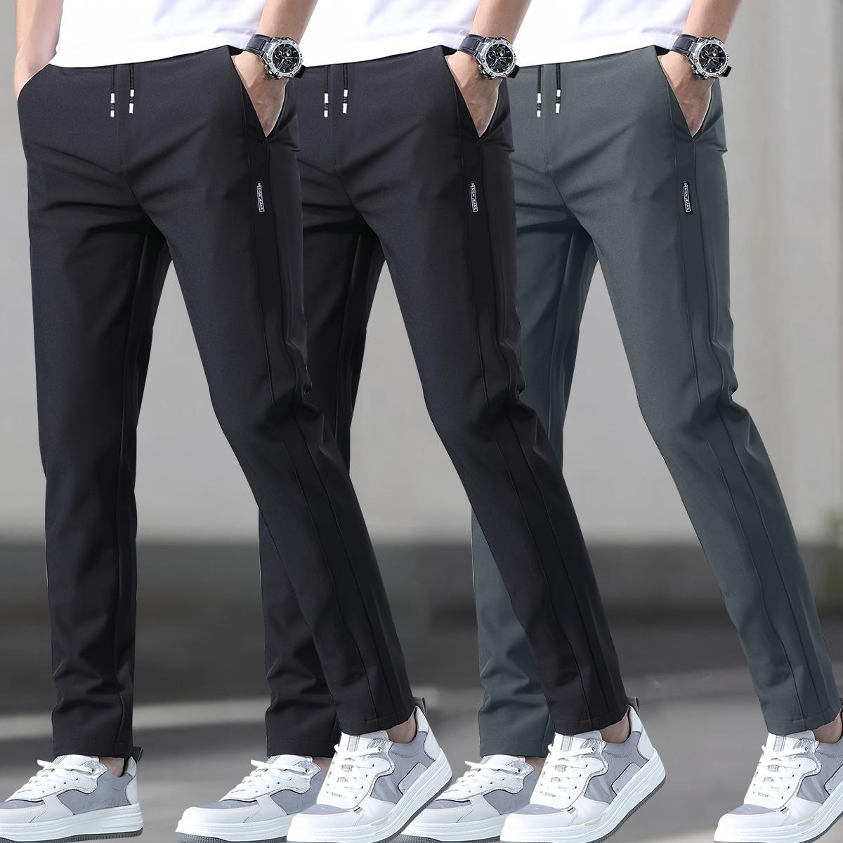 Men's 3-pack slim fit straight leg casual pants, polyester spandex blend, featuring an elastic waistband with drawstring, mid-rise, side pockets, suitable for outdoor activities and everyday wear SpringStatements