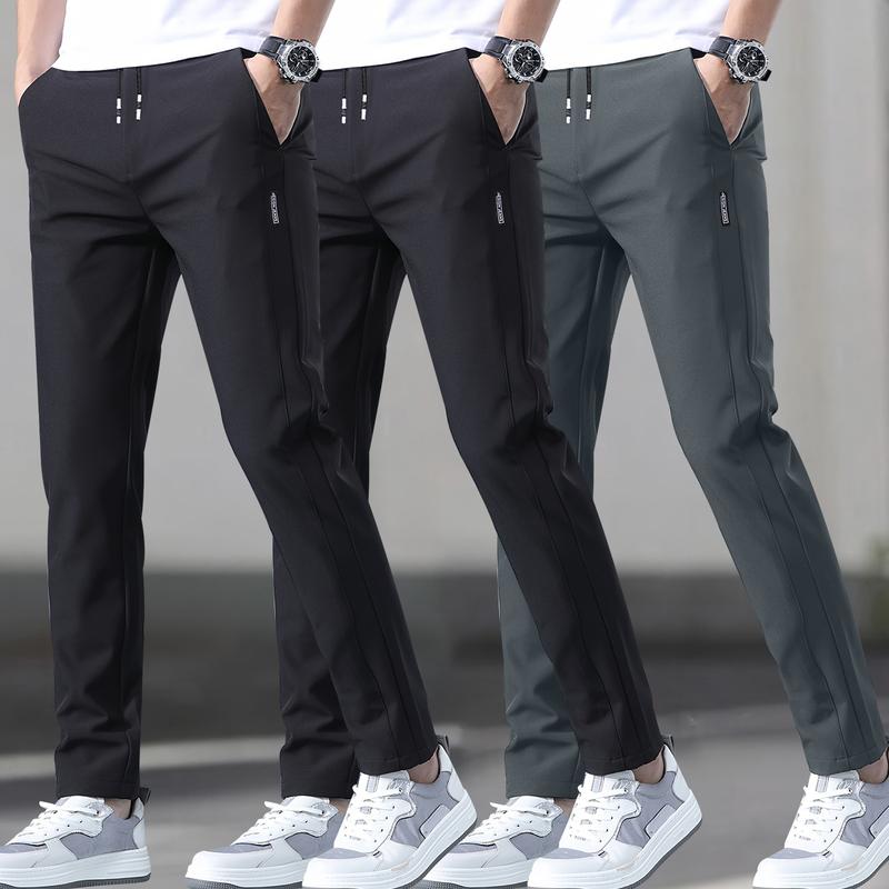 Men's 3-pack slim fit straight leg casual pants, polyester spandex blend, featuring an elastic waistband with drawstring, mid-rise, side pockets, suitable for outdoor activities and everyday wear