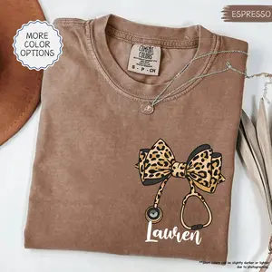 [Custom Name] Comfort Colors Custom Leopard Nurse Shirt, Stethoscope Bow Tee, Coquette Nurse Shirt, Nurse Gift, Nurse Shirt, Nursing School Tee, RN Shirt