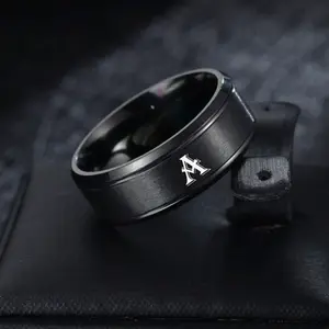 Fashionable silver-plated men's rings with 26 letters to choose from, personalized designs. Jewelry for men to wear daily or as a gift.