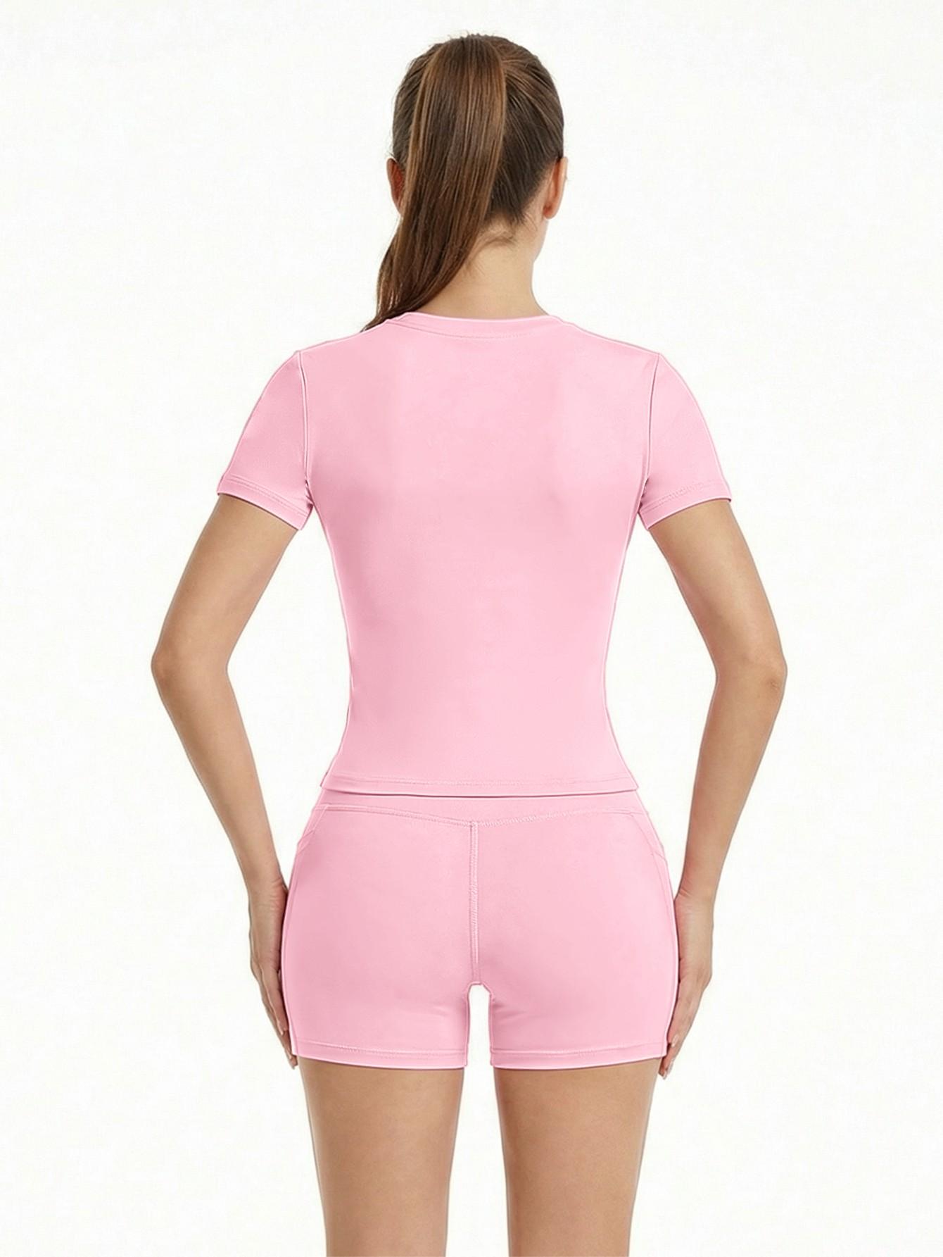 New Women's Two-Piece Set: Solid Color High-End T-shirt and High-Waisted Fitted Shorts Sports Set. This breathable and quick-drying casual sports set is ideal for yoga, gym workouts, summer wear, and fitness running activities.