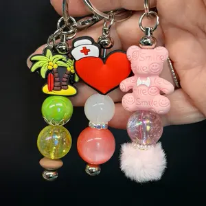 Claim on Lives-Add a little personality to your keys! These handmade beaded keychains.  A variety of fun and meaningful designs including faith-inspired, cute bears, vacation and occupational designs and more! Pompom available for additional cost