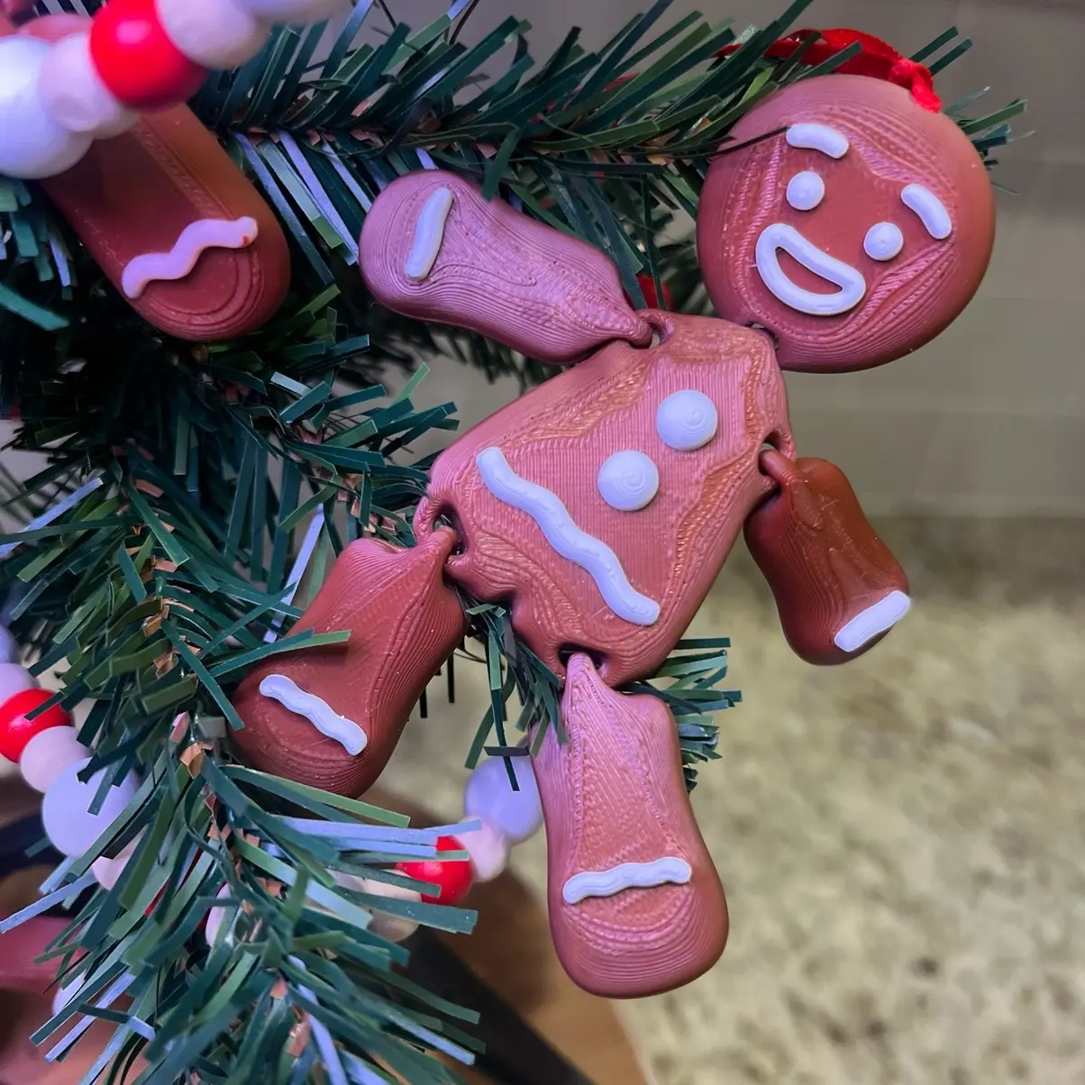 Gingerbread Man Ornaments - 3D Printed Flexible Girl Gingerbread 5” Tall Light Pink Icing Christmas Decorations with String Ready to Hang Christmas Decorations