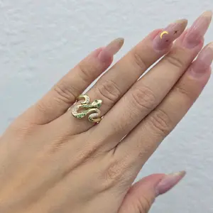 10K Yellow Gold Double Snake Ring with Green Stones