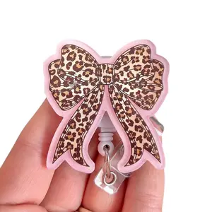 Glitter My Badge Cheetah leopard bow badge reel for nurse and hospital workers. Badge clip Badge pull - Retractable swivel clip with a 360 rotation. Great gift for coworker.