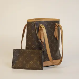 Pre-owned Louis Vuitton Small Monogram Bucket Bag Vintage Model Discontinued Classic Design Brown Canvas Iconic Monogram Pattern Versatile Functionality