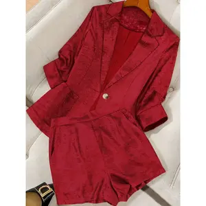 A two-piece women's suit, consisting of a Button Front Blazer and shorts, suitable for home wear, indoor activities, and outdoor outfits.