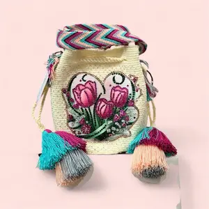 Authentic wayuu backpack, medium size, woven in two threads with application sewn with nylon threads decorated with shiny rhinestones.