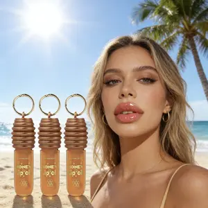 Honey Lip Oil – professional makeup product with keychain for easy carrying; quick-drying formula with a moisturizing jelly texture for smooth lips.