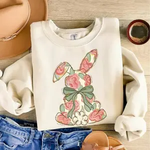 Easter Sweatshirt for women featuring a cute Easter bunny and rabbit design, cozy sweatshirt or tee perfect for spring celebrations and festive holiday outfits