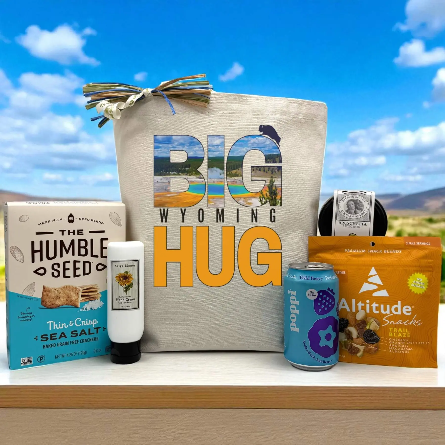 Itsonlynaturalgifts Big Wyoming Hug Gift Basket with Snacks Beverages & Personal Care Items Reusable Tote Humble Seed Crackers Sunflower Hand Creme Poppi Soda Altitude Trail Blaze Mix Cucina & Amore Bruschetta