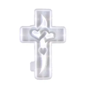 Flexible silicone mold for resin ornaments and home decor, shaped like heart crosses