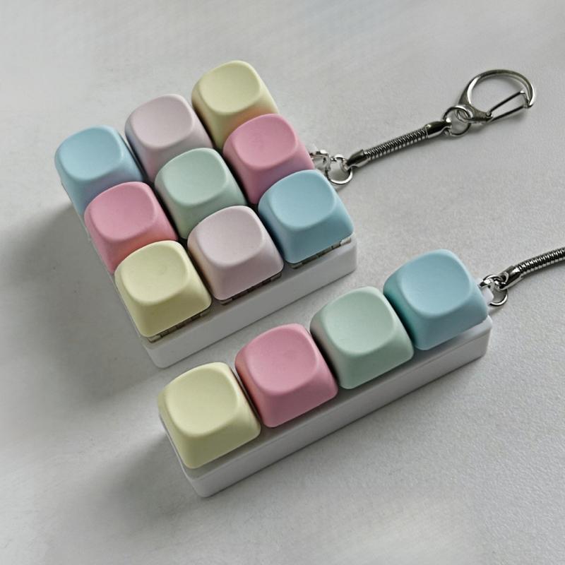 Keyboard-Style Fidget Toy Keychain-Portable Durable Backpack Accessory for Adults with 4 & 9 Key Design and Button Fidget Mindful Fidgeting Aid，Everyday Gift.  Hand Feel. Keystroke Response. Relaxation. Tactile Feedback.  Soft Desk Decor .Crisp Silicone