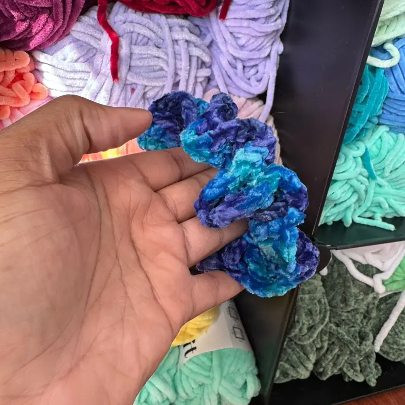 Hand-crocheted blue scrunchie