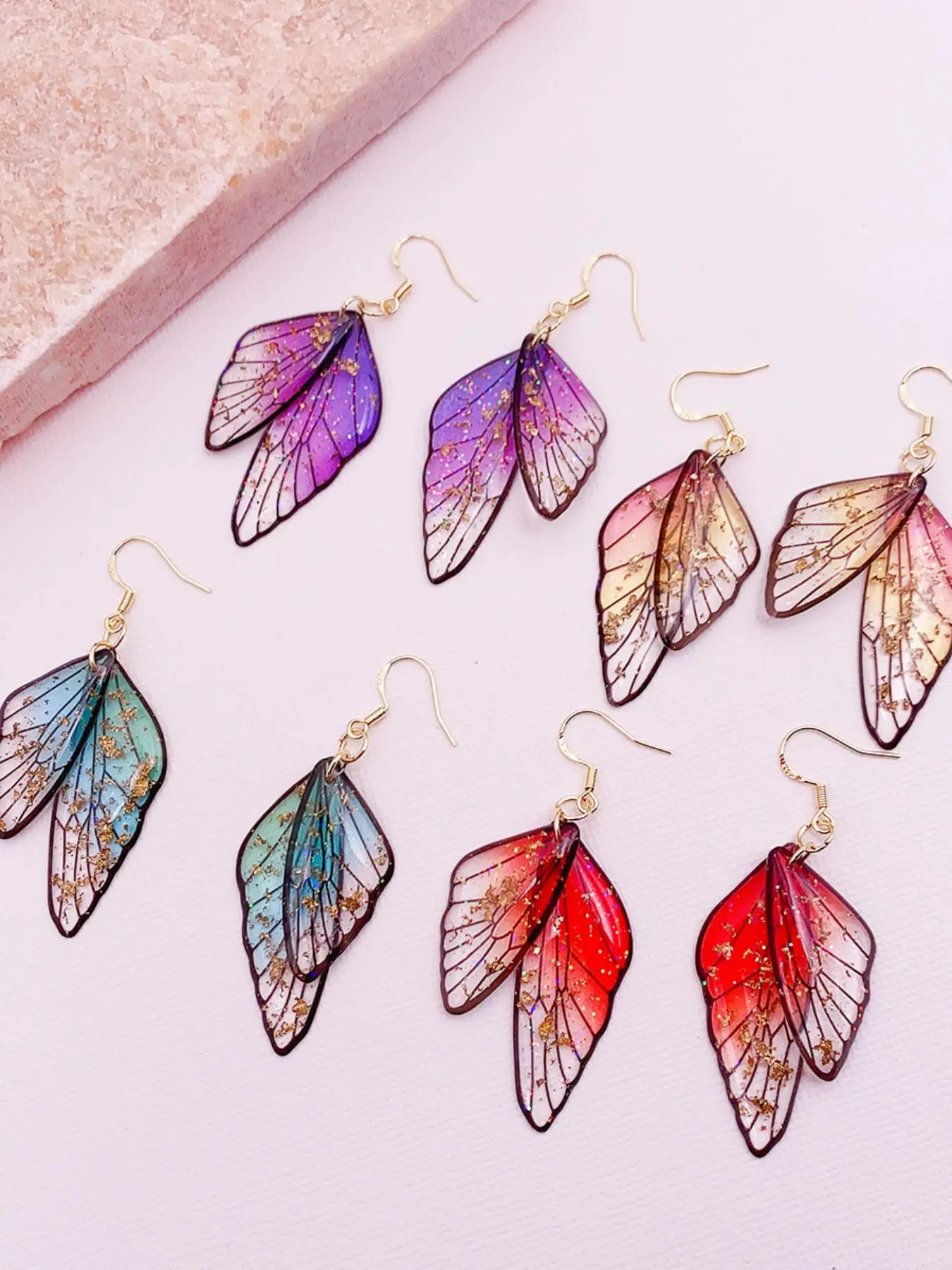 Multicolored pack of fairycore transparent butterfly wing hook earrings, glitter gold flake resin cicada wing dangle jewelry—delicate, elegant ear accessories for ladies’ everyday outfits