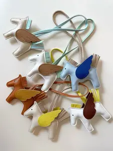 Versatile and fashionable bag charm, crafted with classic PU leather color schemes to create trendy accessories. The elegant design and durable PU material complement each other perfectly.