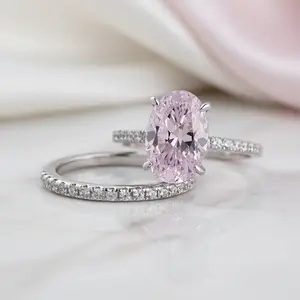 Lovely Oval Cut Pink Sapphire Wedding Ring Set