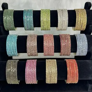 Desi Beautiful Set Of 12 Fitting Stones Bangles.