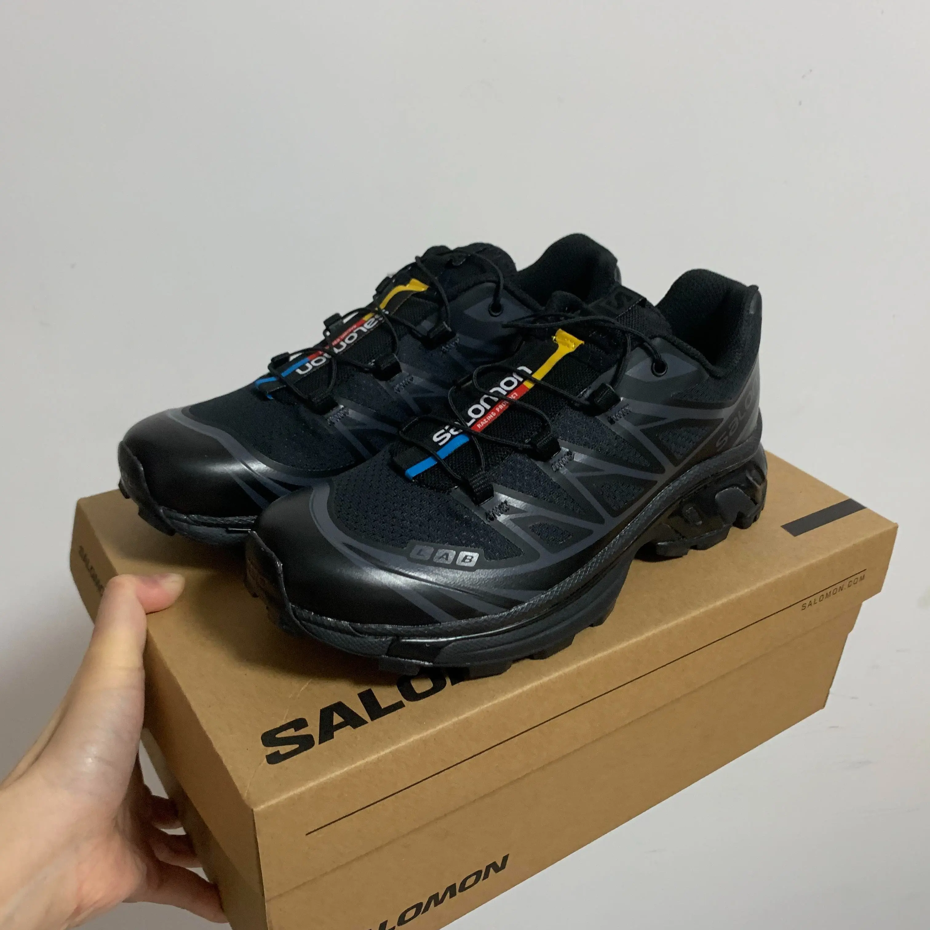 Salomon XT-6 trail running shoes for men and women built with lightweight breathable mesh upper, shock absorption, energy return, quicklace system, stable support for trail running, hiking, outdoor adventure and streetwear lifestyle