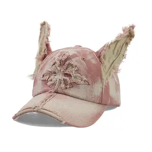Unique distressed tie-dye pink baseball cap with frayed animal cat ears — aesthetic punk goth Y2K streetwear hat for women and men