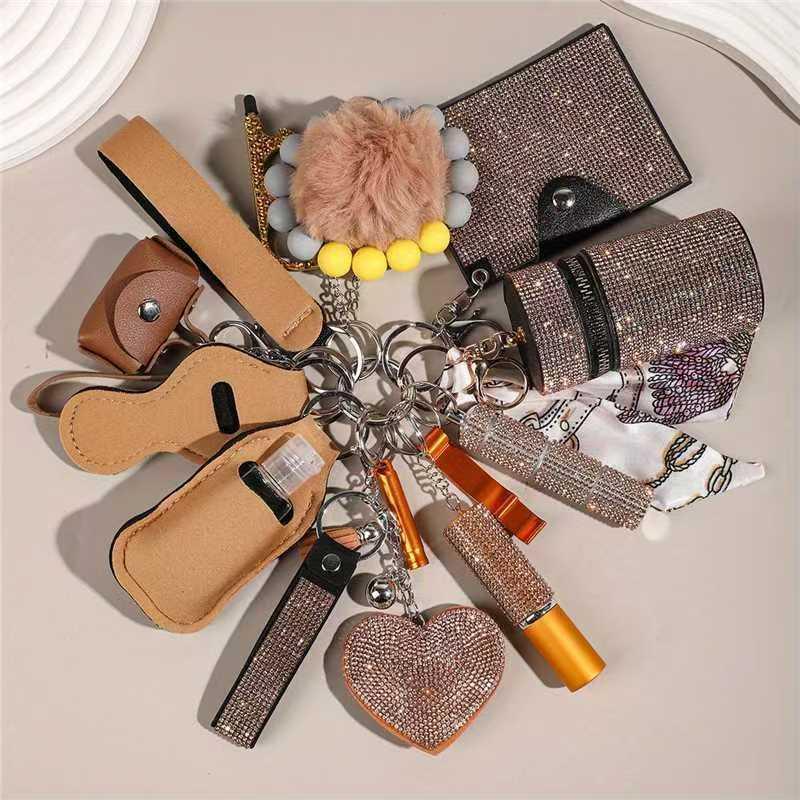 NewDesignHotWholesaleRhinestoneWomenSelf-DefenseAnti-WolfKeychain17pcsSetPompomsAlarmSelfDefense NewDesignHotWholesaleRhinestoneWomenSelf-DefenseAnti-WolfKeychain17pcsSetPompomsAlarmSelfDefense