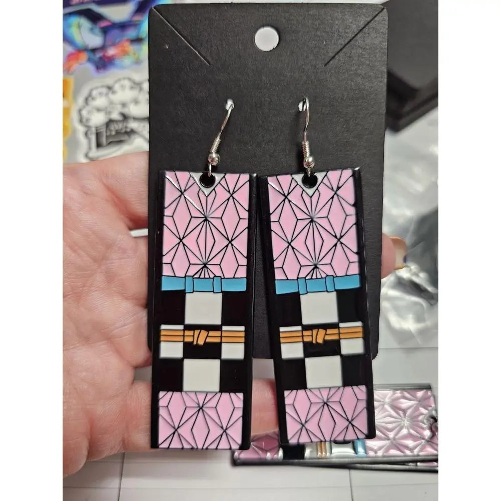 Anime Demon Slayer Nezuko Earrings - Pink and Black Design with Geometric Patterns and Blue Accents