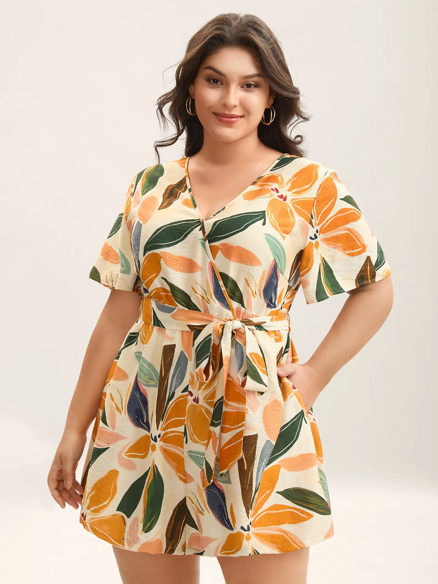 BloomChic Women's Plus Size Boho Floral Romper, Playful Lady's Summer Rayon Garment with an Overlap Collar, Tie-Waist and Pockets, Smooth, Sleeve, Overalls, Shortsleeve, Fabric, Rompers For Women, Nylon, Fit, Low Iron, Short Overalls, Plus Size Overalls