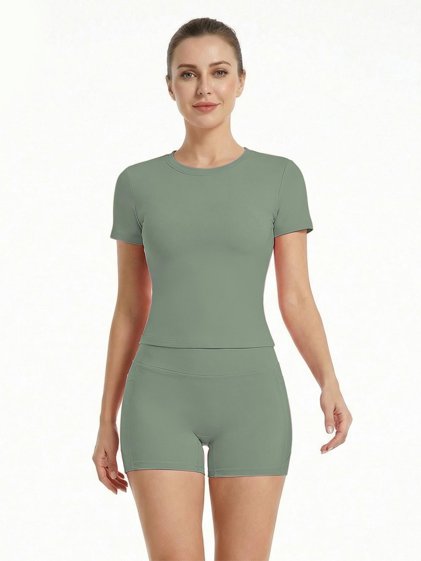 New Women's Two-Piece Set: Solid Color High-End T-shirt and High-Waisted Fitted Shorts Sports Set. This breathable and quick-drying casual sports set is ideal for yoga, gym workouts, summer wear, and fitness running activities.