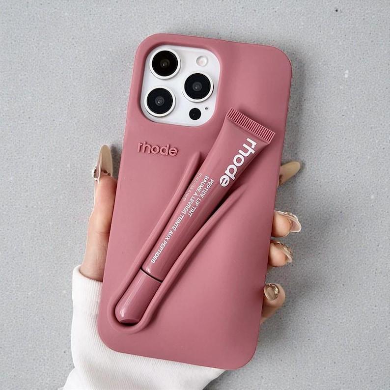 Rhode Lip Tint Silicone Phone Case with Lip Gloss Holder for iPhone 11-17 Shockproof Design Smooth Application Fashionable Protective Nutrients Convenient Daily Use