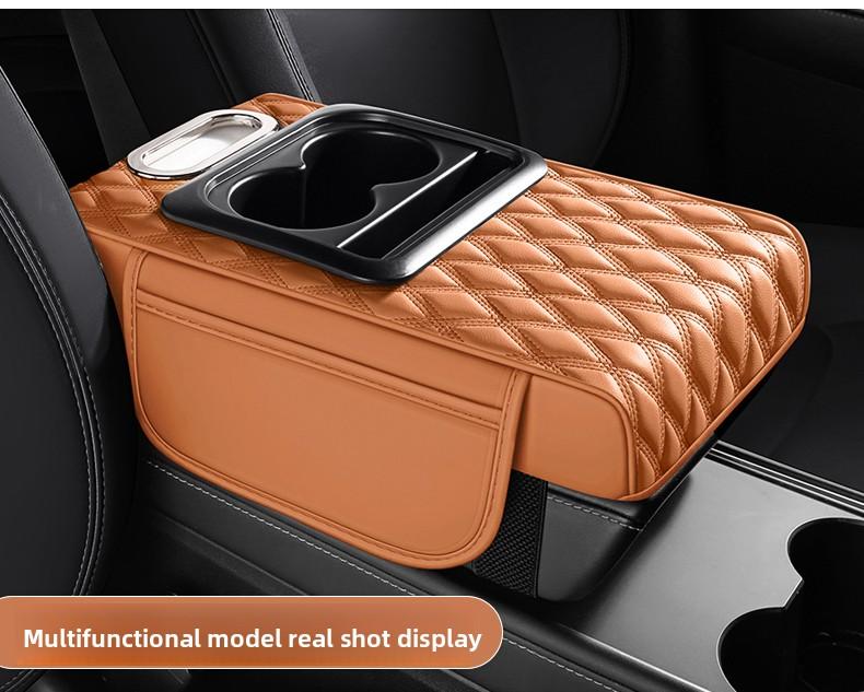 Leather car armrest cushion! This multi-functional pad holds cups, tissues, and storage—no more dangling arms on long drives! Solve all your road trip pain points for the price of a bubble tea!