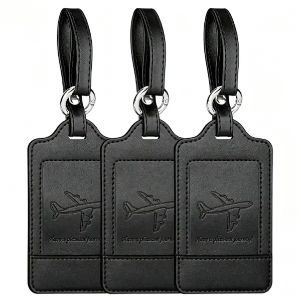 Set of 3 PU leather luggage tags with an embossed airplane design, luggage identification tags featuring slots for name and address, anti-loss travel bag identification tags, and a lanyard with a metal ring