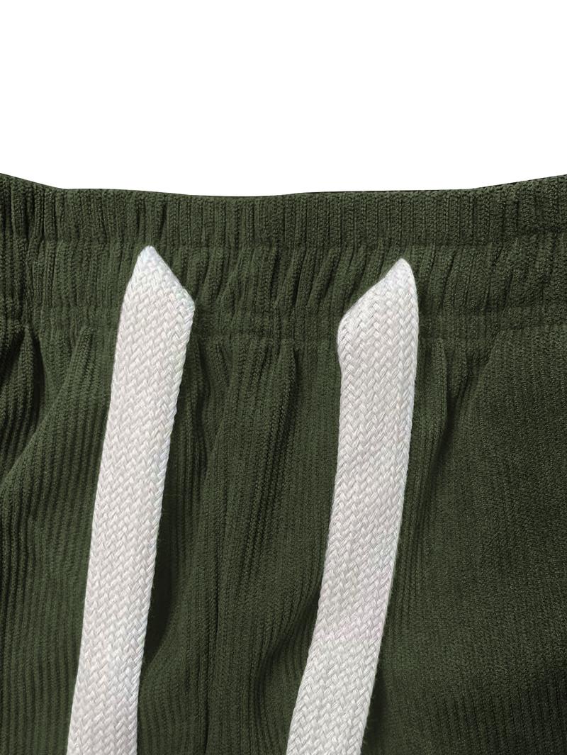 Two men's autumn casual pants featuring a simple and versatile style with drawstring design, adding a casual feel. The pants have delicate small details, such as stitching accents, making them comfortable and stylish. The loose fit provides comfort and fr