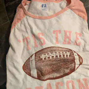 Place Pjs 'Tis The Season Football Graphic pj set for Fans.. teen
