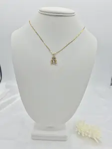 14k gold plated chain with small teddy bear charm.  (18)