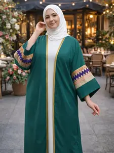 بشت مطرز بالوان زاهية  - A statement embroidered bisht in bright tones paired