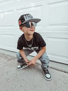 Black sports sunnies w/ silver lens