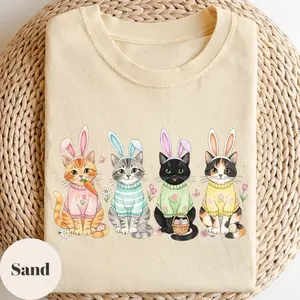 Cute Easter cat T-shirt featuring adorable bunny ear kittens graphic, perfect Cat Mom spring gift, soft pastel holiday tee for her