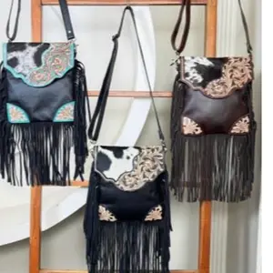 Lainy-Women’s tooled leather fringe purse