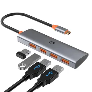 Amazon-branded 4-in-1 USB-C Multi-Function Hub Dock, compatible with laptops and iPad Pro. Features 4 USB 3.1 ports supporting high-speed data transfer at twice the speed of USB 3.0.