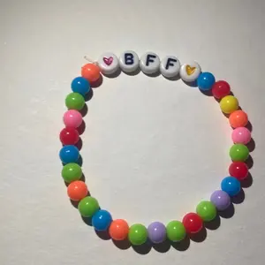 Handmade Colorful Beaded Bracelet with BFF Charm and Heart Accents for Friendship