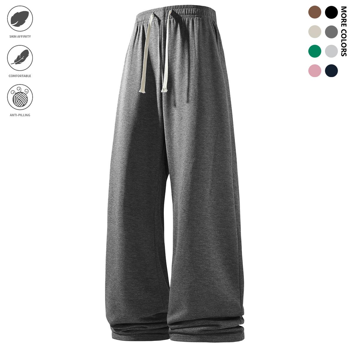 Men's casual sports pants, wide-leg pants, featuring an elastic waistband with drawstring design, casual sports pants suitable for running, fitness, and outdoor activities wear, sports pants, men's trousers