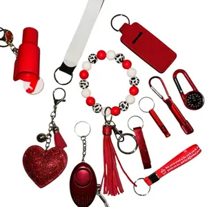Keychain set with Pom Pom. Great for yourself or gift to family or friends. TSA approved